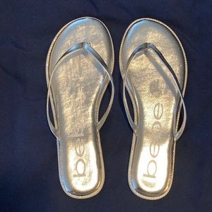 Bebe flip flops… silver size 7